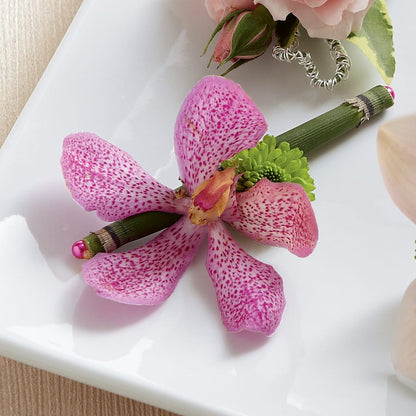 Pink Mokara Boutonniere –  Mary Blooms Florist, Port Saint Lucie FL